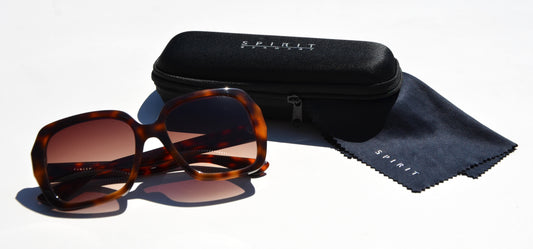 Havana Brown frame sunglasses with gradient amber lenses displayed on a white surface, accompanied by a black Spirit Eyewear branded case and a matching cleaning cloth.