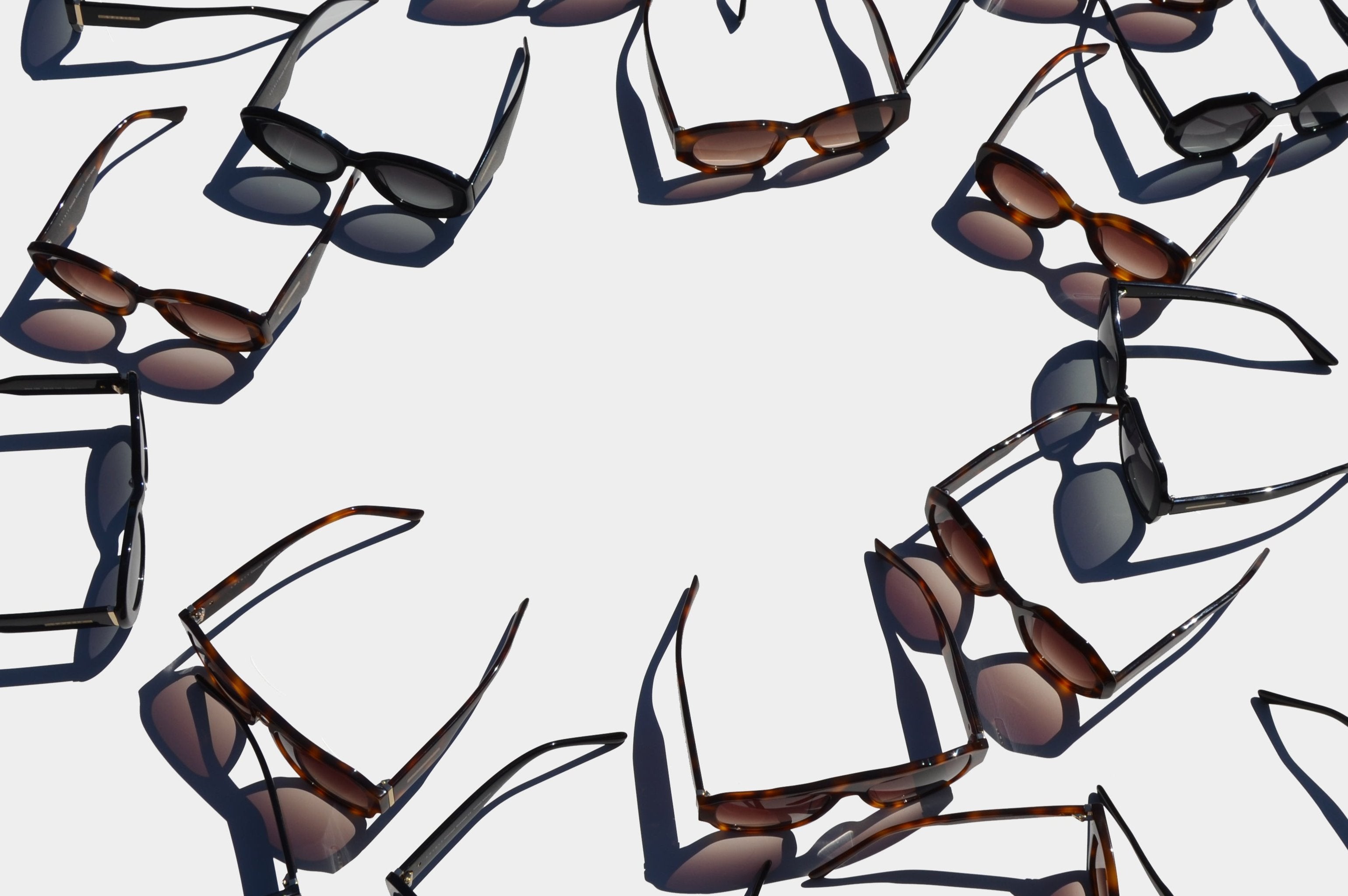 Merhoki sunglasses collection in brown and black, showcasing different shapes