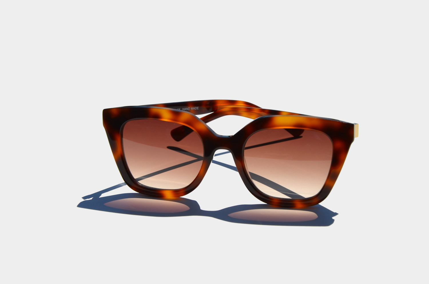 Brown square cat eye sunglasses folded 