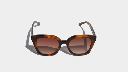 Front view of Havana brown square-frame sunglasses with gradient amber lenses, offering a timeless and sophisticated style.