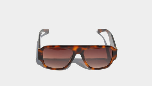 Front view of Havana brown sunglasses with square frames and gradient lenses, exuding timeless elegance and premium design.